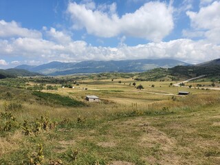 Obraz premium Wonderful plateau in the mountains near metsovo ski resort in the greek mountains. vikos aoos nationalpark and ioannina are close. travel and holiday concept