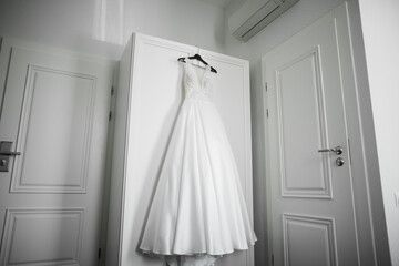 Fototapeta na wymiar The perfect wedding dress in the room of the bride