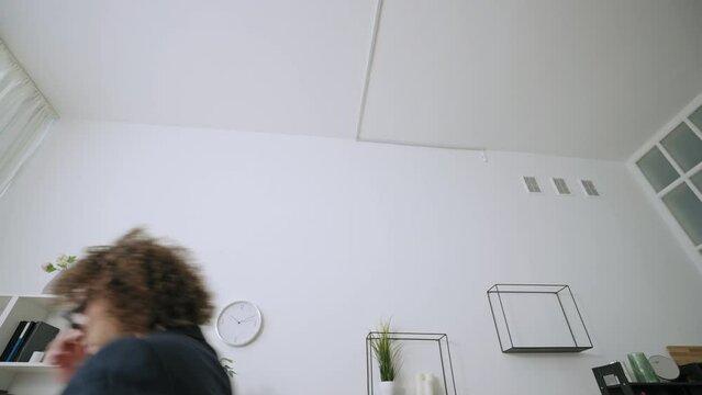 Nerdy office worker quitting his low-paying job, happily leaving workplace