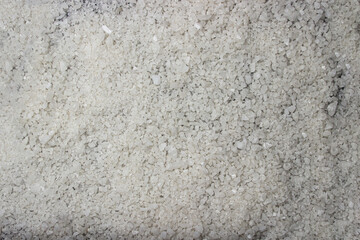 Coarse rock salt in full screen as a background for the image. Rock salt texture