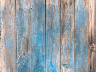 Background of old wood planks with blue paint remains