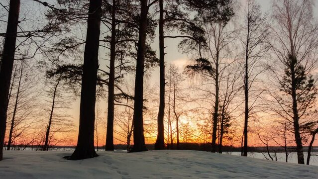 frozen lake in winter at beautiful daybreak, time lapse 4K