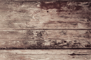 Background of old brown wood texture with paint remains  