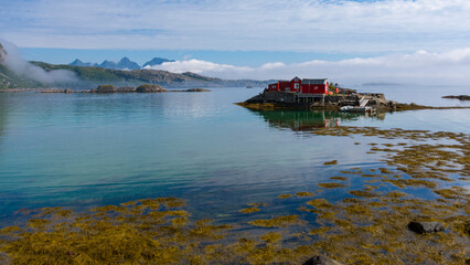 Traditional Norwegian Rorbu on an islet 