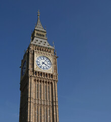 A low angle view of Big Ben, also known as the Queen Elizabeth Tower, at the Houses of Parliament...