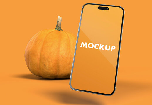 Phone Mockup and Pumpkin in an Yellow Background