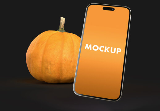 Phone Mockup Mockup with a Realistic Pumpkin on an Black Background