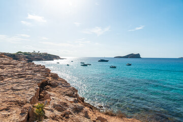 Naklejka na ściany i meble Cala Comte beach in the southwest of the island of Ibiza. Ideal beach for sunset. Balearic