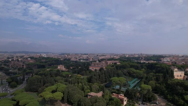 DRONE AERIAL FOOTAGE - Aerial view of the Colosseum in Rome, Italy. The ancient Roman Colosseum is one of the main tourist attractions in Europe.