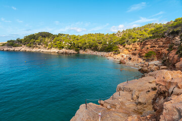 Fototapeta premium Vacation concept, Playa Salada and Saladeta on the coast of Ibiza. Balearic