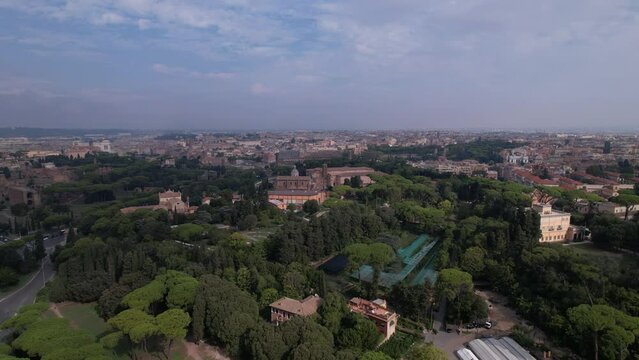 DRONE AERIAL FOOTAGE - Aerial view of the Colosseum in Rome, Italy. The ancient Roman Colosseum is one of the main tourist attractions in Europe.