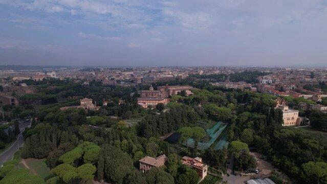 DRONE AERIAL FOOTAGE - Aerial view of the Colosseum in Rome, Italy. The ancient Roman Colosseum is one of the main tourist attractions in Europe.