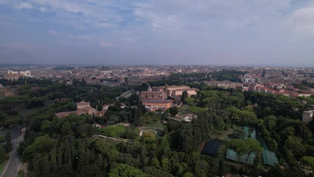 DRONE AERIAL FOOTAGE - Aerial view of the Colosseum in Rome, Italy. The ancient Roman Colosseum is one of the main tourist attractions in Europe.