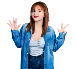 Redhead young woman wearing casual denim jacket showing and pointing up with fingers number eight while smiling confident and happy.