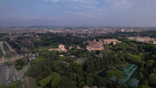 DRONE AERIAL FOOTAGE - The Circus Maximus (Circo Massimo), an ancient Roman chariot-racing stadium and the Colosseum in Rome, Italy.