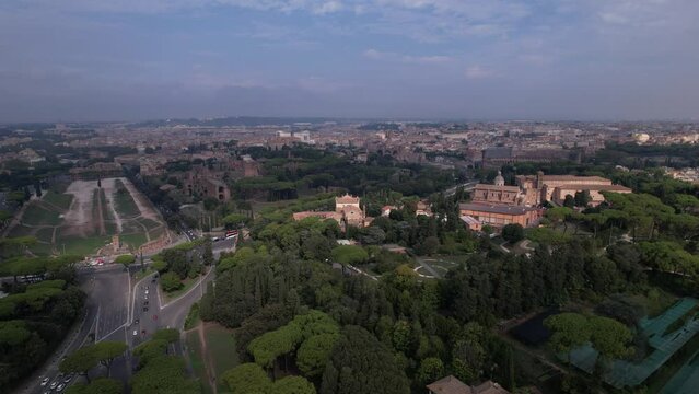 DRONE AERIAL FOOTAGE - The Circus Maximus (Circo Massimo), an ancient Roman chariot-racing stadium and the Colosseum in Rome, Italy.