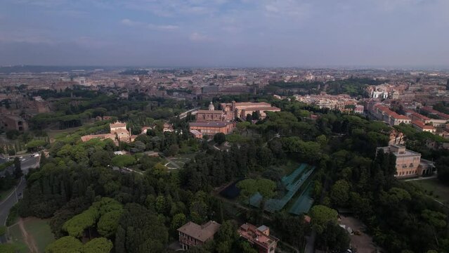 DRONE AERIAL FOOTAGE - Aerial view of the Colosseum in Rome, Italy. The ancient Roman Colosseum is one of the main tourist attractions in Europe.