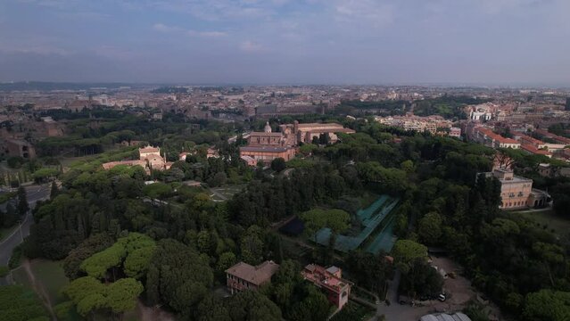 DRONE AERIAL FOOTAGE - Aerial view of the Colosseum in Rome, Italy. The ancient Roman Colosseum is one of the main tourist attractions in Europe.