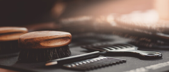 Obraz na płótnie Canvas Barbershop background for men beauty salon, hairdresser tools scissors and comb, copy space, vintage color