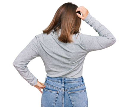 Young beautiful woman wearing casual turtleneck sweater backwards thinking about doubt with hand on head