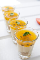 pastry wallpaper, glasses with passion fruit jelly and cream, catering service with gourmet desserts