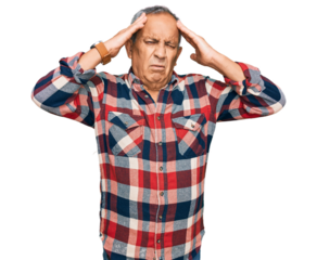 Senior hispanic man wearing casual clothes suffering from headache desperate and stressed because pain and migraine. hands on head.