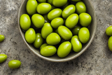 green olives, a source of olive oil, and a breakfast food item