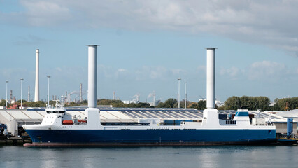 Port of Rotterdam, Netherlands - 10 05 2022: Retrofitted vessel with tillable rotor sails during...