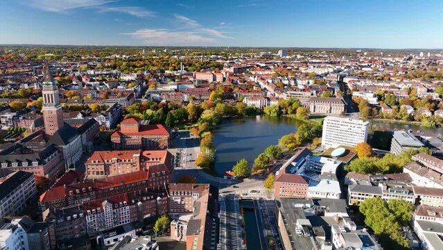 Aerial view of Kiel skyline by Kleiner Kiel, state capital of Schleswig-Holstein, Germany, Europe.  Golden autumn mood in Kiel with view on town hall and Hirosima park, Schleswig-Holstein, Germany.
