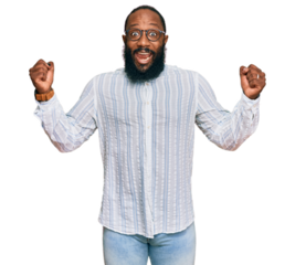 Young african american man wearing business shirt and glasses screaming proud, celebrating victory and success very excited with raised arms