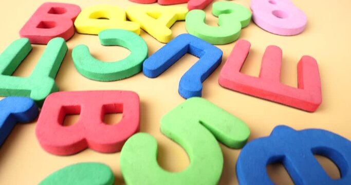 multi colored magnetic numbers and letters for teaching preschoolers. High quality 4k footage