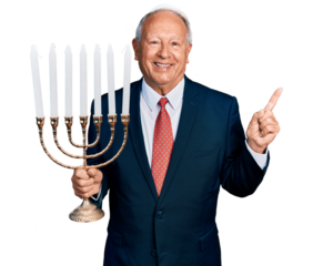 Senior business man with grey hair holding menorah hanukkah jewish candle smiling happy pointing with hand and finger to the side