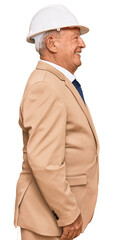 Senior caucasian man wearing architect hardhat looking to side, relax profile pose with natural face with confident smile.