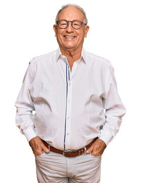 Senior caucasian man wearing business shirt and glasses with a happy and cool smile on face. lucky person.