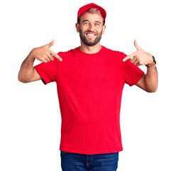 Young handsome blond man wearing t-shirt and cap looking confident with smile on face, pointing oneself with fingers proud and happy.