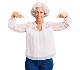 Senior grey-haired woman wearing casual clothes looking confident with smile on face, pointing oneself with fingers proud and happy.