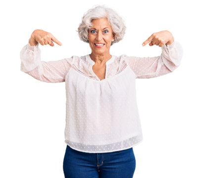 Senior grey-haired woman wearing casual clothes looking confident with smile on face, pointing oneself with fingers proud and happy.