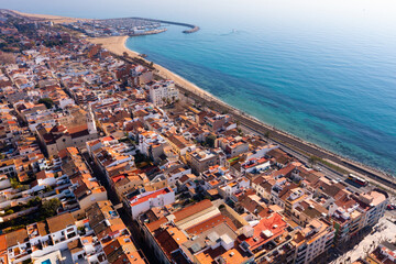 Scenic drone view of seaside areas of Catalan city of Premia de Mar with modern residential...