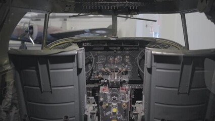 This video shows a POV perspective of a vintage military plane's cockpit.