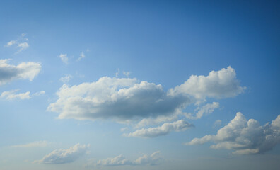 Beautiful blue sky with fluffy white clouds