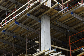 construction site metal beam structure concrete support frame