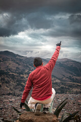 person on the top of the mountain