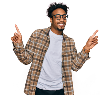 Young african american man with beard wearing casual clothes and glasses smiling confident pointing with fingers to different directions. copy space for advertisement