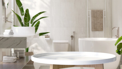 White round side table, bathtub, counter and tropical plant in modern and luxury bathroom with...