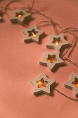 garland of stars on a light background , New Year's concept