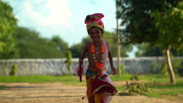 Lord Krishna running in the ground on Happy Janmashtami holiday Indian festival greeting background