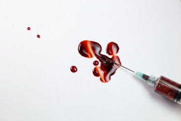 Jeringa con sangre, gotas de sangre, muestras de sangre, VIH, enfermedades transmitidas por la...
