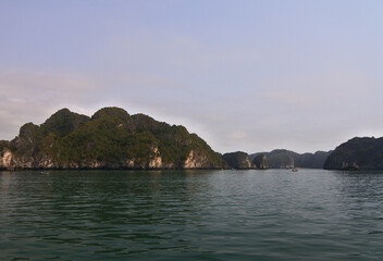Obraz premium One day tour with traditional Vietnam boat in Cat Ba island. Cat Ba is one of popular tourist attraction beside Ha Long Bay in Vietnam.