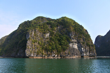 Naklejka premium One day tour with traditional Vietnam boat in Cat Ba island. Cat Ba is one of popular tourist attraction beside Ha Long Bay in Vietnam.