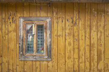 small village home exterior with old window